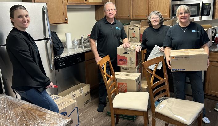 Focused blogger working on project at home