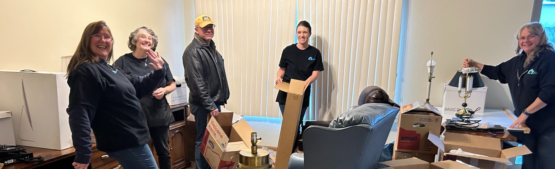 Close-Up Shot of Men Carrying a Couch